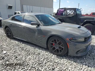 2019 Dodge Charger Scat Pack z VIN 2C3CDXGJ2KH633854, wystawiony jako Copart lot #53296705 z przebiegiem 74 285 mil mil oraz Czysty tytuł • Clean title. Historia ofert i sprzedaży dostępna na DreamBid. Obrazek 4.