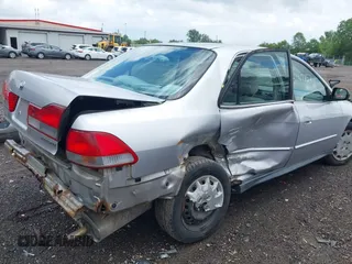 2002 Honda Accord LX with VIN 3HGCG56492G706612, listed as a IAAI auction lot 41917752 with 200,435 mi miles and . Bid and sale history available at DreamBid. Image 6.