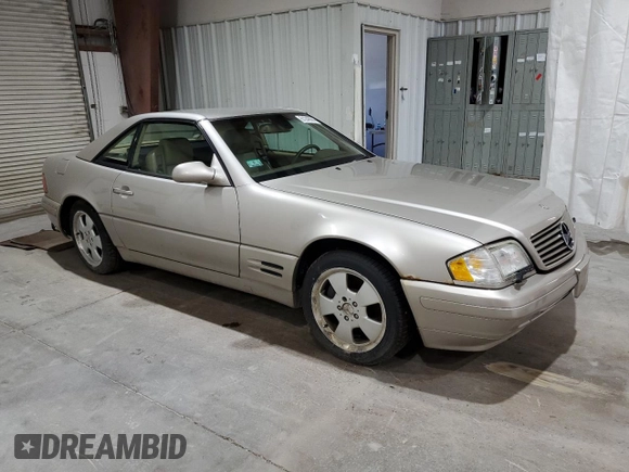 1999 Mercedes-Benz SL-Class with VIN WDBFA68F9XF172312, listed as a Copart auction lot 61248884 with 104,331 mi miles and Salvage Title. Bid and sale history available at carsss.com. Image 4.