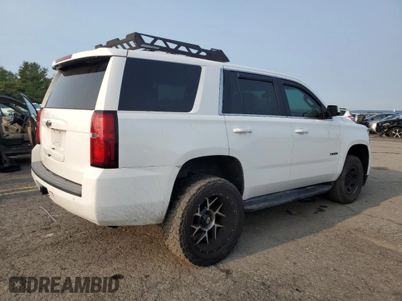 2015 Chevrolet Tahoe Commercial with VIN 1GNLC2EC1FR296841, listed as a Copart auction lot 60160605 with 105,096 mi miles and Salvage title. Bid and sale history available at DreamBid. Image 3.