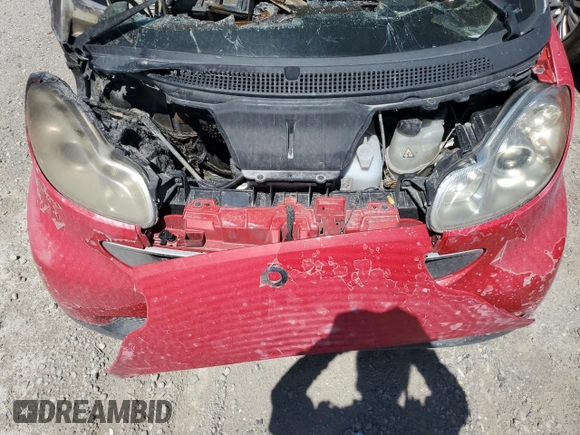 2009 Smart fortwo Passion z VIN WMEEK31X99K211682, wystawiony jako Copart lot #54110385 z przebiegiem Nie podano mil oraz Szkoda całkowita • Salvage title. Historia ofert i sprzedaży dostępna na DreamBid. Obrazek 11.