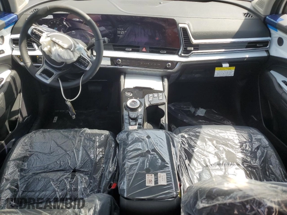 2025 Kia Sportage SX-Prestige with VIN KNDPXCDG5S7228122, listed as a Copart auction lot 54553875 with 20 mi miles and Salvage title. Bid and sale history available at DreamBid. Image 8.
