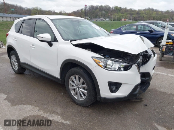 2015 Mazda CX-5 Touring with VIN JM3KE2CY3F0550624, listed as a IAAI auction lot 41931268 with 51,588 mi miles and . Bid and sale history available at carsss.com. Image 1.