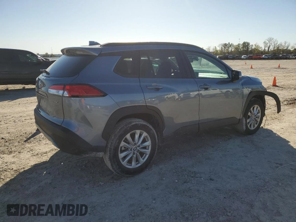 2023 Toyota Corolla Cross LE with VIN 7MUCAAAG8PV060228, listed as a Copart auction lot 86827224 with 40,395 mi miles and Salvage title. Bid and sale history available at DreamBid. Image 3.