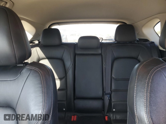 2018 Mazda CX-5 Grand Touring с VIN JM3KFADM2J1310339, выставлен на аукционе Copart как лот 64705245 с пробегом 63 927 миль миль и Списание • Salvage title. История ставок и продаж доступна на DreamBid. Изображение 10.