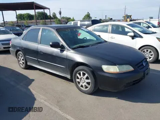 2002 Honda Accord SE z VIN 1HGCG66852A138835, wystawiony jako IAAI lot #42394453 z przebiegiem 196 541 mil mil oraz . Historia ofert i sprzedaży dostępna na DreamBid. Obrazek 1.