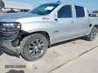 2020 Chevrolet Silverado 1500 LT with VIN 1GCUYDED4LZ240844, listed as a IAAI auction lot 41864044 with 128,665 mi miles and . Bid and sale history available at DreamBid. Image 6.
