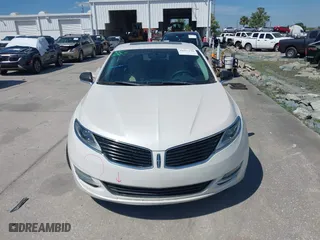 2014 Lincoln MKZ Hybrid with VIN 3LN6L2LU3ER819681, listed as a IAAI auction lot 41867338 with 149,964 mi miles. Bid and sale history available at carsss.com. Image 13.