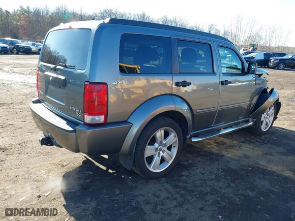 2011 Dodge Nitro Heat with VIN 1D4PU4GX9BW607188, listed as a IAAI auction lot 41100616 with 86,062 mi miles. Bid and sale history available at carsss.com. Image 4.