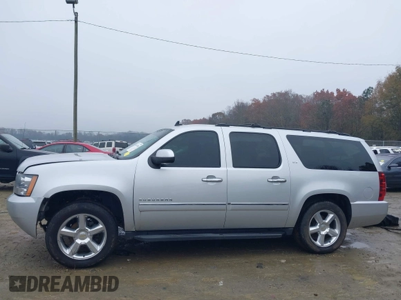 2014 Chevrolet Suburban LTZ with VIN 1GNSCKE05ER173446, listed as a IAAI auction lot 41047096 with 189,049 mi miles and . Bid and sale history available at DreamBid. Image 15.