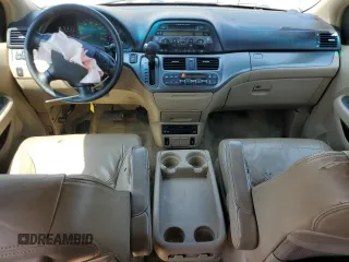 2006 Honda Odyssey EX-L z VIN 5FNRL38726B425098, wystawiony jako Copart lot #56143585 z przebiegiem 153 137 mil mil oraz Szkoda całkowita • Salvage title. Historia ofert i sprzedaży dostępna na DreamBid. Obrazek 8.