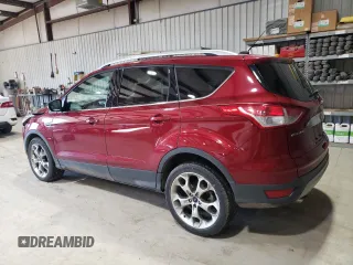 2016 Ford Escape Titanium with VIN 1FMCU9J92GUB31948, listed as a Copart auction lot 44810705 with 179,350 mi miles and Salvage Title. Bid and sale history available at DreamBid. Image 2.