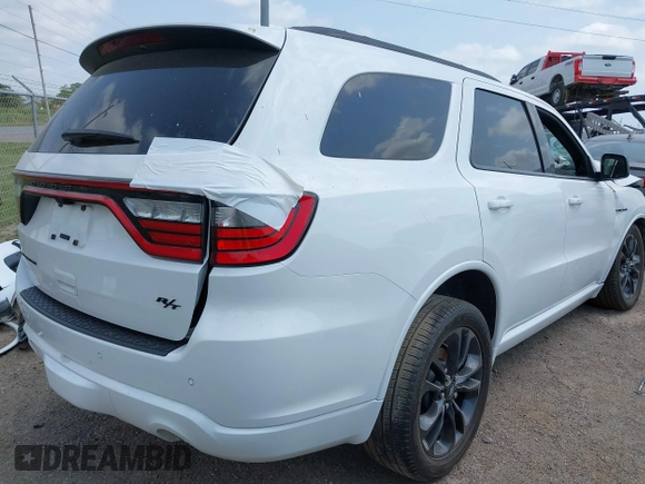 2023 Dodge Durango R/T Plus with VIN 1C4SDHCT7PC686970, listed as a IAAI auction lot 42156304 with 14,592 mi miles and . Bid and sale history available at DreamBid. Image 4.
