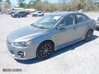2017 Mitsubishi Lancer ES with VIN JA32U2FU1HU007318, listed as a IAAI auction lot 41908084 with 159,564 mi miles. Bid and sale history available at carsss.com. Image 2.