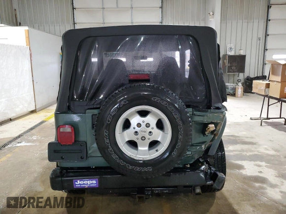 1999 Jeep Wrangler Sport with VIN 1J4FY19S8XP490177, listed as a Copart auction lot 46136045 with 243,883 mi miles and Salvage Title. Bid and sale history available at carsss.com. Image 6.