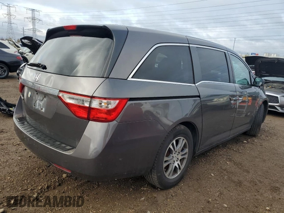 2011 Honda Odyssey EX-L with VIN 5FNRL5H65BB029311, listed as a Copart auction lot 81916724 with 184,034 mi miles and Salvage Title. Bid and sale history available at DreamBid. Image 3.