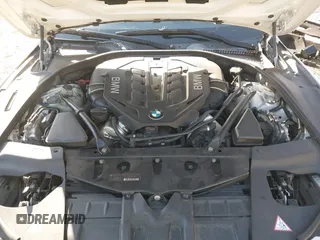 2015 BMW 6 Series 650i with VIN WBA6B2C54FGB99173, listed as a IAAI auction lot 41692594 with 123,664 mi miles and . Bid and sale history available at carsss.com. Image 10.