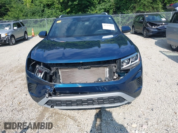 2022 Volkswagen Atlas SE z VIN 1V2HE2CA7NC211835, wystawiony jako IAAI lot #42722660 z przebiegiem 56 112 mil mil oraz . Historia ofert i sprzedaży dostępna na DreamBid. Obrazek 6.