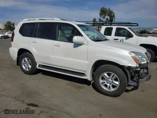 2004 Lexus GX 470 with VIN JTJBT20X340067025, listed as a Copart auction lot 74555384 with 95,321 mi miles and Salvage Title. Bid and sale history available at carsss.com. Image 4.