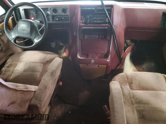 1992 Chevrolet Chevy Van z VIN 2GBEG25K3N4150299, wystawiony jako Copart lot #74099444 z przebiegiem 156 341 mil mil oraz Tytuł czysty. Historia ofert i sprzedaży dostępna na DreamBid. Obrazek 8.