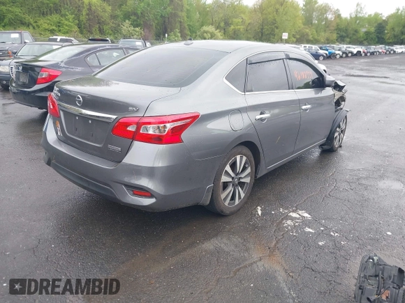 2019 Nissan Sentra S z VIN 3N1AB7AP7KY238779, wystawiony jako IAAI lot #42182339 z przebiegiem 75 136 mil mil oraz . Historia ofert i sprzedaży dostępna na DreamBid. Obrazek 4.