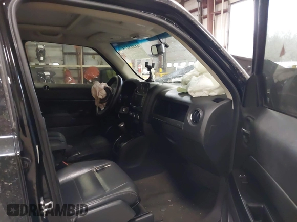 2014 Jeep Patriot Latitude with VIN 1C4NJPFA9ED887903, listed as a IAAI auction lot 41228274 with 82,225 mi miles and . Bid and sale history available at carsss.com. Image 5.