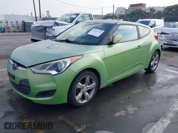 2012 Hyundai Veloster w/Gray Int z VIN KMHTC6AD3CU025315, wystawiony jako IAAI lot #42097741 z przebiegiem 146 726 mil mil oraz . Historia ofert i sprzedaży dostępna na DreamBid. Obrazek 2.