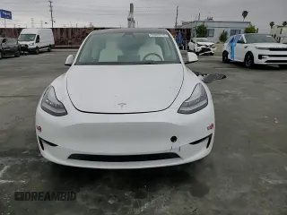 2021 Tesla Model Y Long Range with VIN 5YJYGDEEXMF151686, listed as a Copart auction lot 53903115 with 65,321 mi miles and Salvage Title. Bid and sale history available at DreamBid. Image 14.