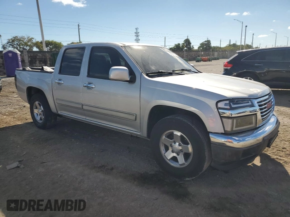 2012 GMC Canyon SLE1 with VIN 1GTD5MFE9C8108474, listed as a Copart auction lot 82650124 with 219,772 mi miles and Salvage Title. Bid and sale history available at carsss.com. Image 4.
