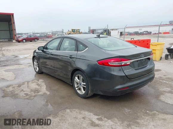 2018 Ford Fusion SE with VIN 3FA6P0H74JR125727, listed as a IAAI auction lot 41661939 with 100,446 mi miles. Bid and sale history available at carsss.com. Image 3.