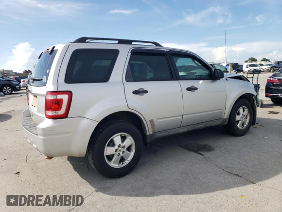 2012 Ford Escape XLS with VIN 1FMCU0C70CKA83668, listed as a Copart auction lot 61737275 with 245,744 mi miles and Salvage title. Bid and sale history available at DreamBid. Image 3.