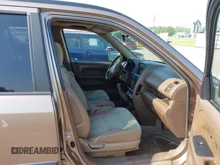 2003 Honda CR-V EX z VIN JHLRD78843C039985, wystawiony jako IAAI lot #42410668 z przebiegiem 208 567 mil mil oraz . Historia ofert i sprzedaży dostępna na DreamBid. Obrazek 5.