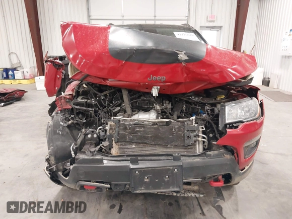 2021 Jeep Compass Trailhawk z VIN 3C4NJDDBXMT586981, wystawiony jako IAAI lot #42116028 z przebiegiem 70 317 mil mil oraz . Historia ofert i sprzedaży dostępna na DreamBid. Obrazek 13.