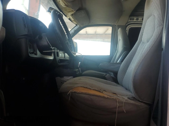 2006 Chevrolet Express Cargo with VIN 1GCGG25V961171309, listed as a Copart auction lot 64814815 with 199,033 mi miles and Salvage title. Bid and sale history available at DreamBid. Image 7.