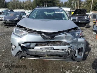 2018 Toyota RAV4 XLE with VIN 2T3RFREV6JW815119, listed as a Copart auction lot 49270895 with 109,427 mi miles and Salvage Title. Bid and sale history available at carsss.com. Image 5.