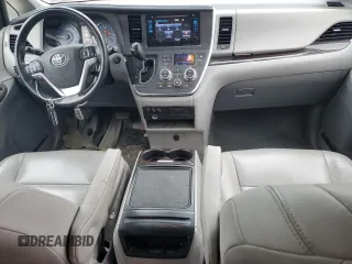 2015 Toyota Sienna XLE with VIN 5TDYK3DC1FS648469, listed as a Copart auction lot 57471975 with 118,567 mi miles and Non repairable. Bid and sale history available at DreamBid. Image 8.