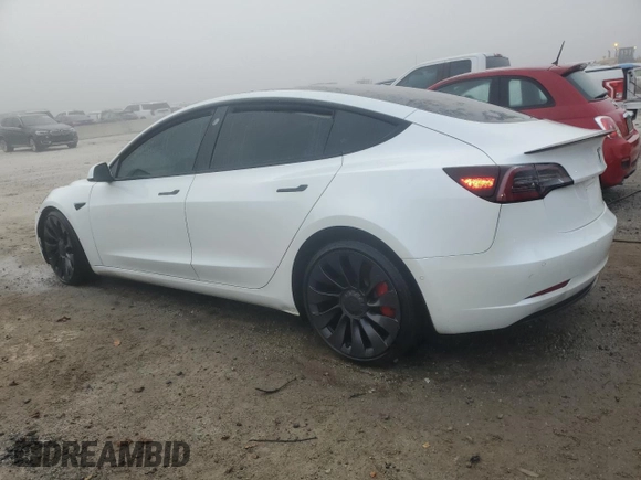 2021 Tesla Model 3 Performance with VIN 5YJ3E1ECXMF984417, listed as a Copart auction lot 48465675 with 60,838 mi miles and Clean Title. Bid and sale history available at DreamBid. Image 2.