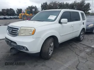 2014 Honda Pilot EX-L with VIN 5FNYF3H54EB003916, listed as a IAAI auction lot 41518679 with 147,456 mi miles. Bid and sale history available at carsss.com. Image 2.