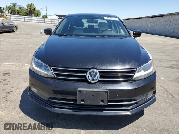 2015 Volkswagen Jetta Sport z VIN 3VWD17AJ4FM401214, wystawiony jako Copart lot #61095445 z przebiegiem 104 833 mil mil oraz Czysty tytuł • Clean title. Historia ofert i sprzedaży dostępna na DreamBid. Obrazek 5.