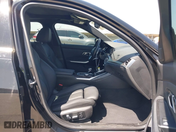 2019 BMW 3 Series 330i with VIN WBA5R1C51KFH09402, listed as a IAAI auction lot 41869138 with 59,115 mi miles and . Bid and sale history available at DreamBid. Image 5.
