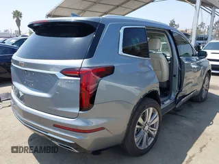 2023 Cadillac XT6 FWD Premium Luxury with VIN 1GYKPCRS6PZ163018, listed as a IAAI auction lot 42437403 with 21,366 mi miles and . Bid and sale history available at DreamBid. Image 4.