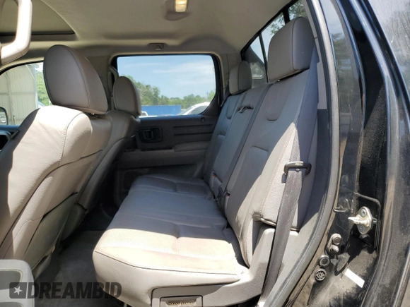 2012 Honda Ridgeline RTL z VIN 5FPYK1F51CB460223, wystawiony jako Copart lot #58218915 z przebiegiem 190 012 mil mil oraz Szkoda całkowita • Salvage title. Historia ofert i sprzedaży dostępna na DreamBid. Obrazek 10.