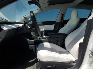2020 Tesla Model 3 Standard Range Plus with VIN 5YJ3E1EA5LF599280, listed as a Copart auction lot 52383295 with 58,506 mi miles and Salvage Title. Bid and sale history available at DreamBid. Image 7.