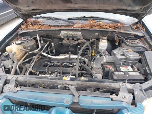2005 Mazda Tribute i with VIN 4F2YZ02Z85KM19097, listed as a IAAI auction lot 41547466 with 121,709 mi miles and . Bid and sale history available at carsss.com. Image 10.