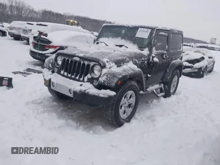 2014 Jeep Wrangler Sahara with VIN 1C4AJWBG3EL190302, listed as a IAAI auction lot 41299284 with 112,476 mi miles and . Bid and sale history available at DreamBid. Image 18.