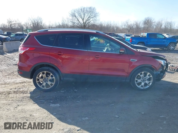 2015 Ford Escape Titanium z VIN 1FMCU9J9XFUC75357, wystawiony jako IAAI lot #41705474 z przebiegiem 198 381 mil mil oraz . Historia ofert i sprzedaży dostępna na DreamBid. Obrazek 13.