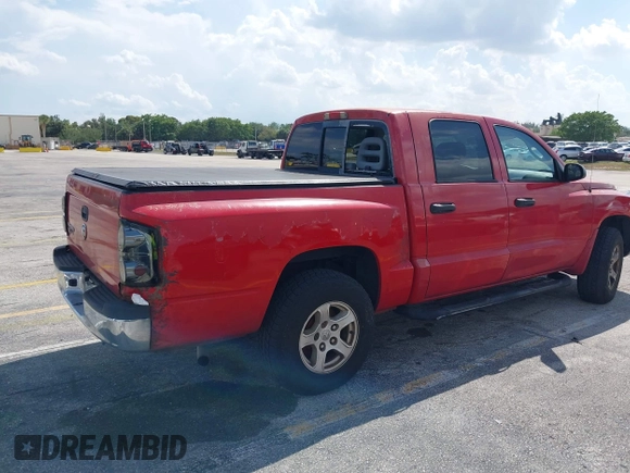 2006 Dodge Dakota SLT with VIN 1D7HE48K06S517772, listed as a IAAI auction lot 41946417 with 255,236 mi miles and . Bid and sale history available at carsss.com. Image 4.