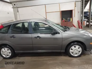 2007 Ford Focus S with VIN 1FAFP37N87W333049, listed as a IAAI auction lot 41450683 with 307,869 mi miles and . Bid and sale history available at carsss.com. Image 13.