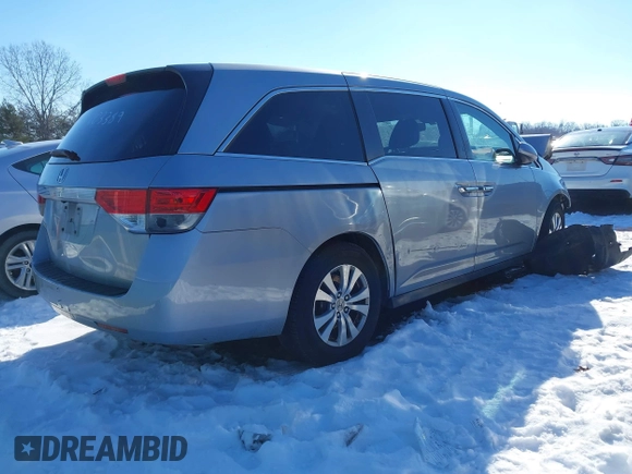 2017 Honda Odyssey EX-L with VIN 5FNRL5H6XHB003389, listed as a IAAI auction lot 41329731 with 203,368 mi miles and . Bid and sale history available at DreamBid. Image 4.