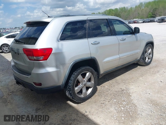 2012 Jeep Grand Cherokee Overland with VIN 1C4RJECTXCC317018, listed as a IAAI auction lot 41975933 with 191,043 mi miles. Bid and sale history available at carsss.com. Image 4.
